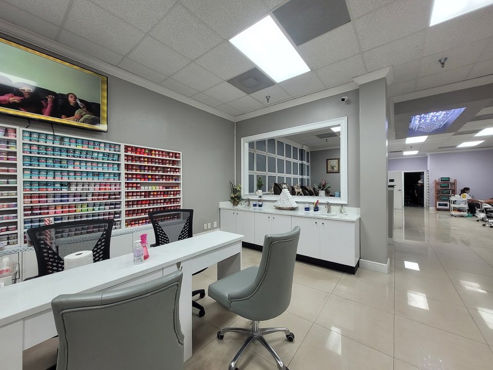 Clean nail salon interior with bright lighting.